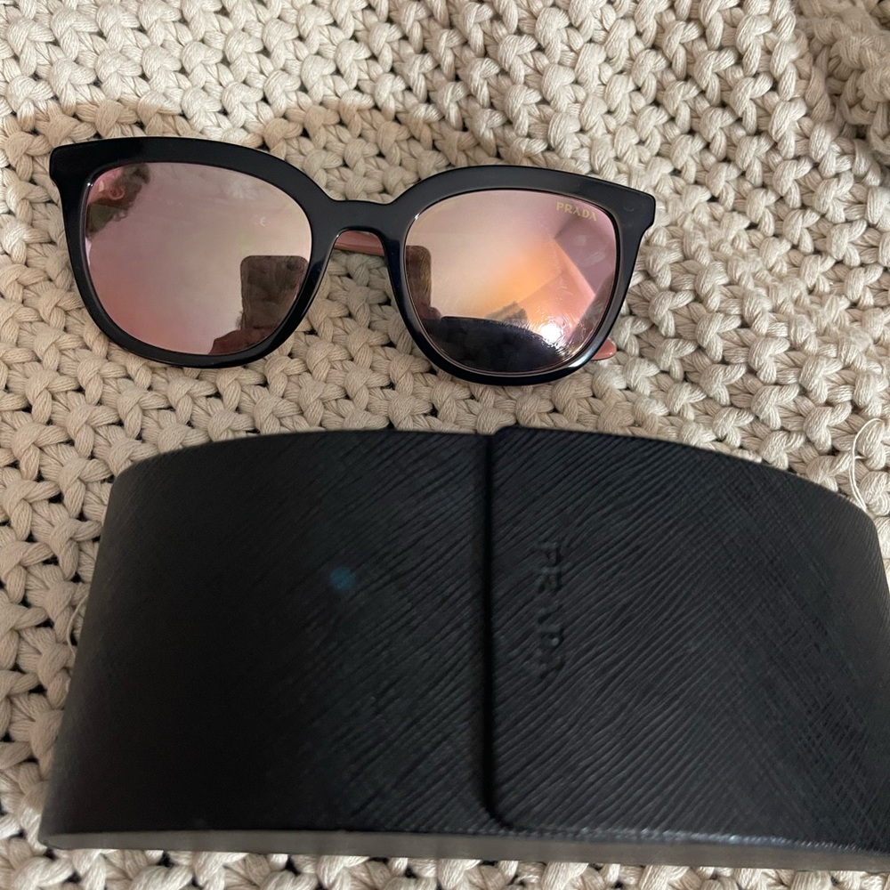 Prada Black Frame Sunglasses with Rose-Tinted Lenses